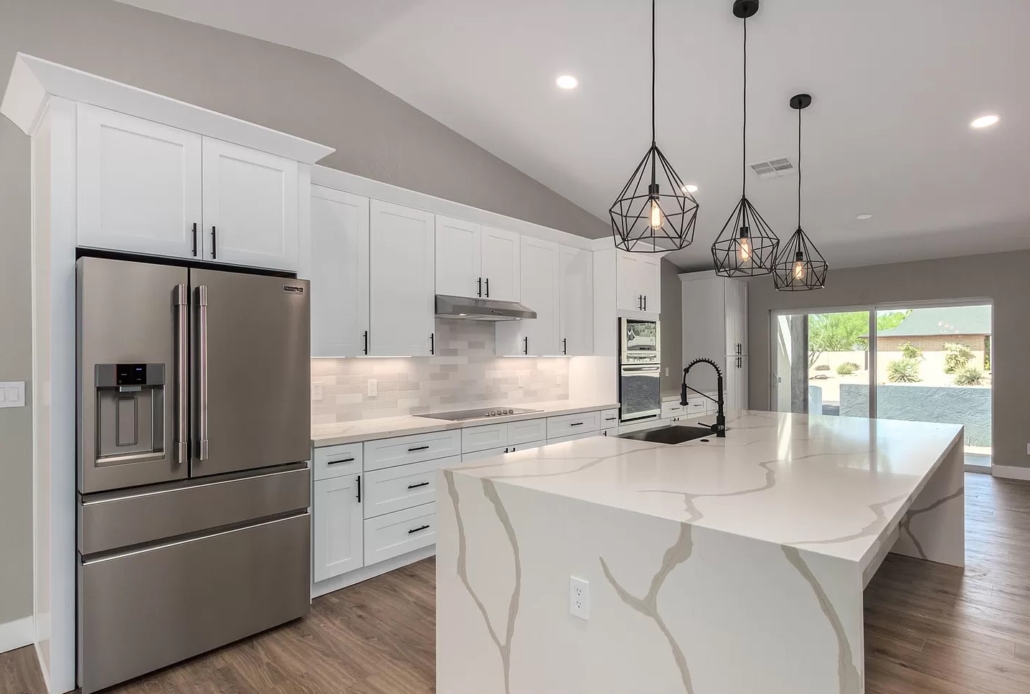 white kitchen with large island photo